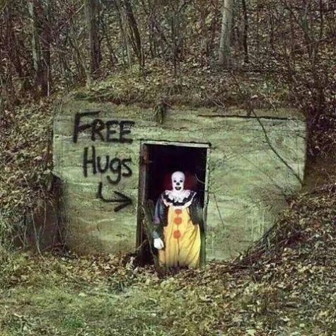 A mysterious picture of a creepy clown posing near an abandoned house. This picture was commonly reposted online during the clown hoax.  (Courtesy of google images/imgur)