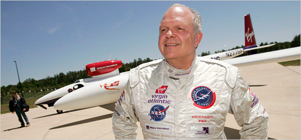 Steve Fossett poses in front of his Virgin GlobalFlyer. Fossett used the same aircraft to set his 67 hour, record setting journey.