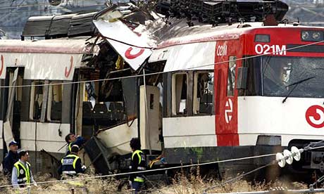 Investigators from Spain and Interpol comb the site of one of the blasts for evidence.