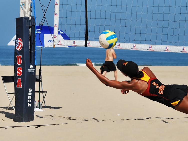 Collegiate+beach+volleyball+is+emerging+into+the+spotlight+of+college+sports.++NCAA+finally+recognized+beach+volleyball+as+a+college+sport+and+is+now+helping+it+transition+from+an+emerging+sport+to+a+Championship+sport.++A+college+player+for+USC+dove+for+a+stray+ball+at+one+of+the+first+college+beach+volleyball+tournaments.