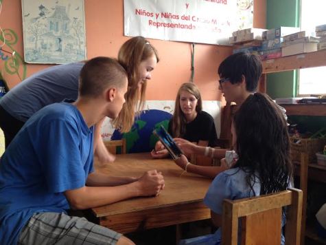 David Barlett, Dana Hensler, Chloe Celniker, and Adam Lee interact with children at a preschool. This was just one of the places where MV students were able to give back to the local community.