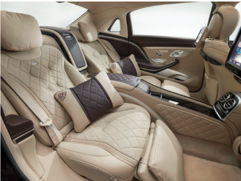 The rear seats of the S600 are designed to provide occupants with an opulent and functional seating space. Key features include heated massage, power footrest, tray tables, and full entertainment systems.