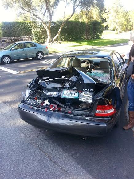 Nick Thakar's Lexus sits totaled at the side of the road. This October 21 accident involved 4 cars and caused widespread delay for the afternoon school commute.