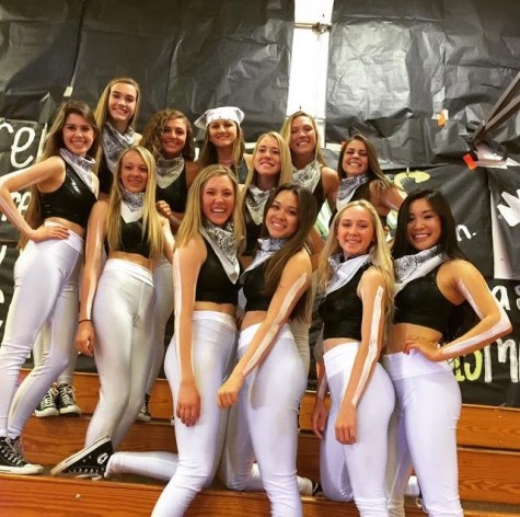 The advanced dance girls getting ready to perform at the spring rally on April 17. Alexa Stedman, Christy Carson, Natile Mauch, Tiffany Tran (seniors) are pictured above in their outfits.