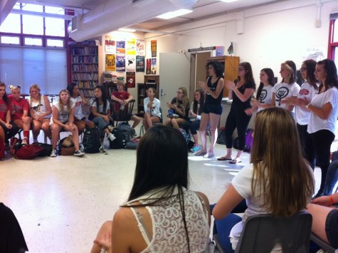 The new members of MV Women's Empowerment club gather in a supportive circle in the drama room. Officers, from left to right, Leona Tafaghodi (12), Kayla Gosnell (12), Marissa Conlon (11), Katie Munger (11), Anna Chiniquy (11), and Brooke Blackman (11) begin their meeting by sharing their unique inspiration stories. They lead the other members into sharing their own reasons for being a feminist. Chiniquy and Munger sport their new club T-shirts. 