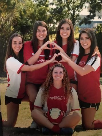 Left to right, Ashlyn Gonzales, Megan Brear , Alexis Liautaud, Alyssa Rutchena, and Nicole Varon, bottom all pose for a team soccer photo. They all played on the recreational level team, the Cosmos, up until high school, but decided to come back and play one last time for their senior year. (Courtesy of Megan Brear)