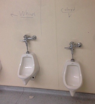 The graffiti was found in the boys restroom in the 900 wing. This picture was tweeted out by ABC7 News Reporter Amy Hollyfield.