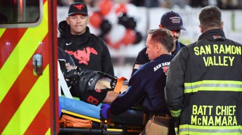 Monte Vista High football player Nate Rutchena (8) is loaded into an ambulance after being injured in the fourth quarter of their football game against San Ramon Valley High in Danville, Calif., on Friday, Oct. 26, 2018. San Ramon Valley Highs Jacob Himan (4) was also injured on the play and transported to the hospital. (Doug Duran/Bay Area News Group)
