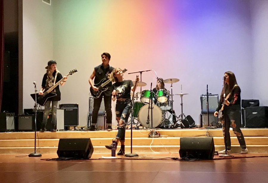 The four members of the “Step Back” band performs at the San Ramon Teen Rock Band Showcase. Although they did not come out on top, they received one of the top votes. 