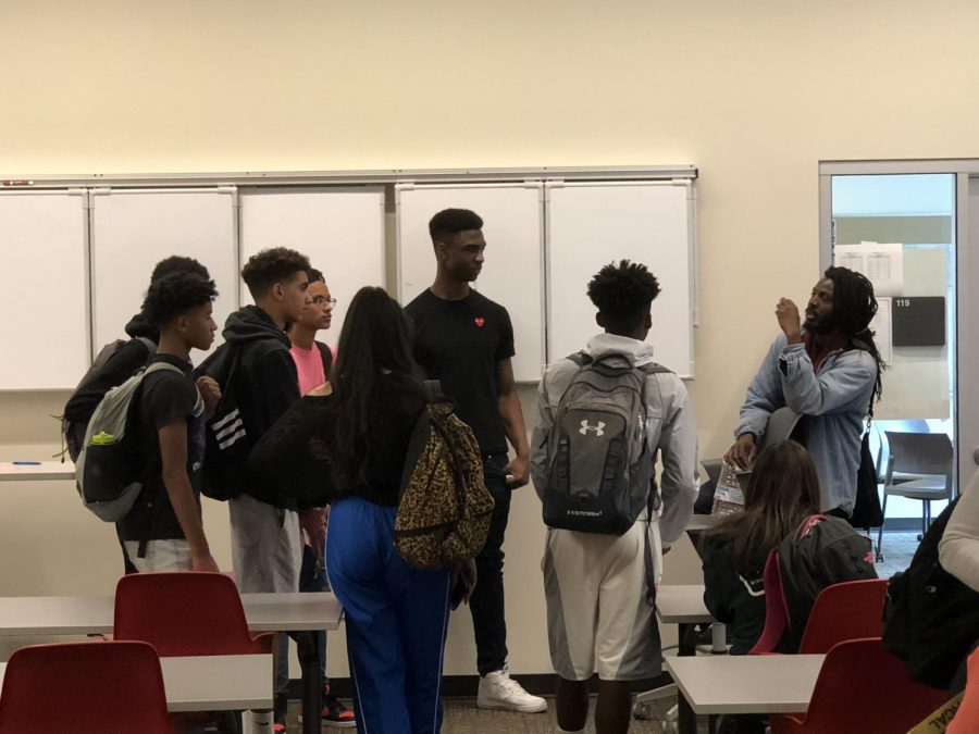 Poet+Donte+Clark+speaks+with+Monte+Vista+students+inside+the+Student+Workday+Center.+He+has+been+meeting+with+students+every+other+Thursday+where+they+have+discussed+about+racial+topics.