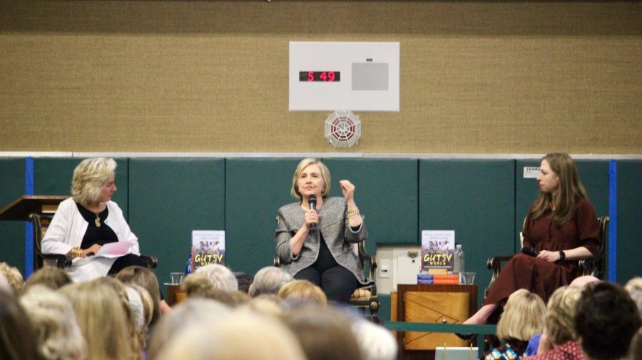 Former First Lady and presidential candidate Hillary Clinton (middle) speaks about The Book of Gutsy Women, a novel she wrote with her daughter, Chelsea (right), as moderator Susie Buell (left) leads the discussion. Students, parents, teachers and families attended the event at the San Ramon Valley High School gym and were empowered by the conversation.
