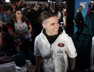 San Francisco 49ers assistant coach Katie Sowers talks to reporters ahead of Super Bowl 54 at Marlins Park in Miami during opening night. The 49ers and Sowers ended up losing to the Kansas City Chiefs 31-20.

