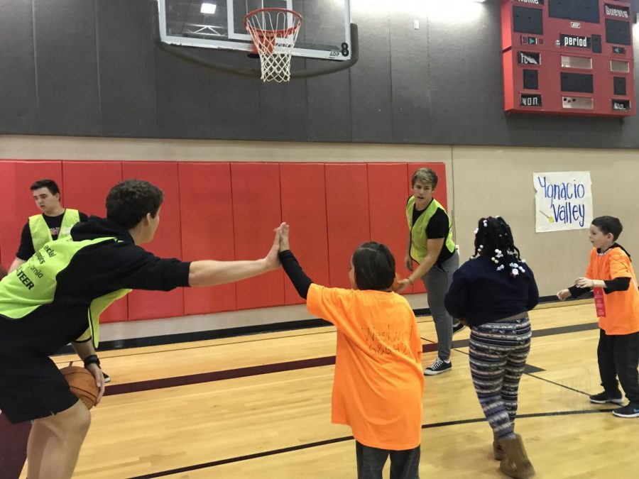Monte Vista Special Olympics club members and leadership students teach special needs students basketball skills in the school’s 12th year hosting. The event included a basketball tournament and skills section.