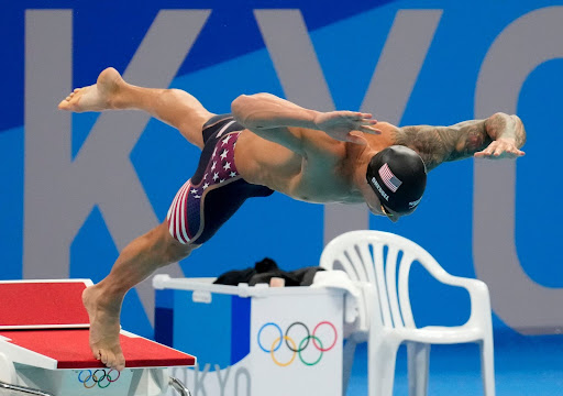 Olympic gold medalist Caeleb Dressel wearing the Speedo LZR Pure Intent fast-suit at the summer Tokyo Olympic Games. This is a popular racing suit at both the amateur and competitive level.