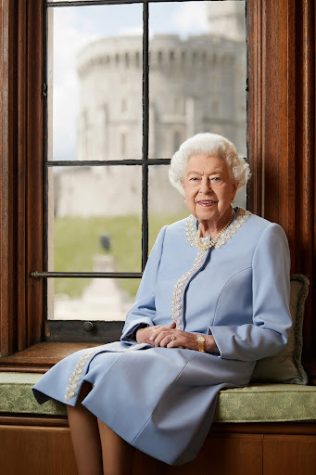 Queen Elizabeth is posing for a portrait. This is to celebrate the accession of attaining a Platinum Jubilee. The Platinum Jubilee highlights the milestone of 70 years reigning as the monarch Queen Elizabeth received in 2022. 
