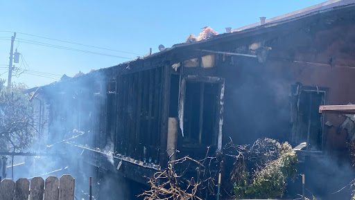 Drummond and her neighbor’s home after the fire. The fire started between 12:30 am and 1:00 pm on Wednesday, September 9th.