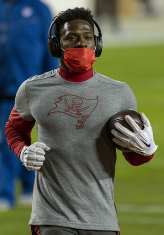 Antonio Brown warming up before a game with the Buccaneers in 2020. Earlier this year, Brown was released from the team and has not played professional football since.