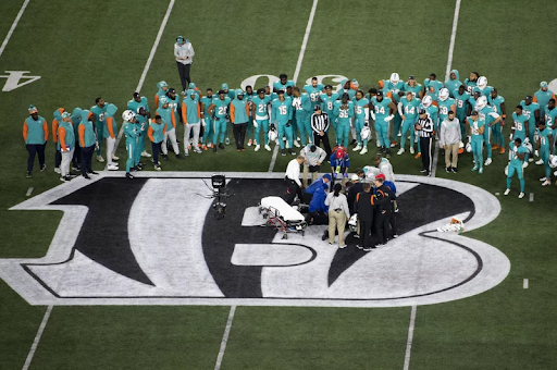 The scene after Miami Dolphins’ quarterback Tua Tagovailoa suffered a major blow to his head and neck area. Tagovailoa remained on the ground for roughly 12 minutes before he was carted off the field.