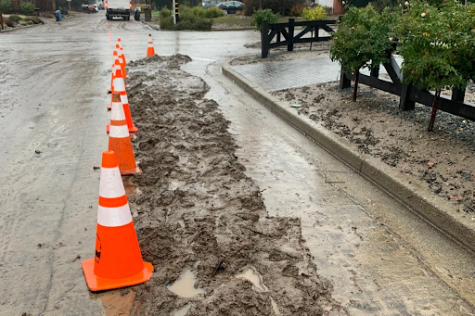 Rain water causes a mudslide on the side of the road. Severe rain storms in Danville, caused floods, mudslides, and power outages all throughout the city. 