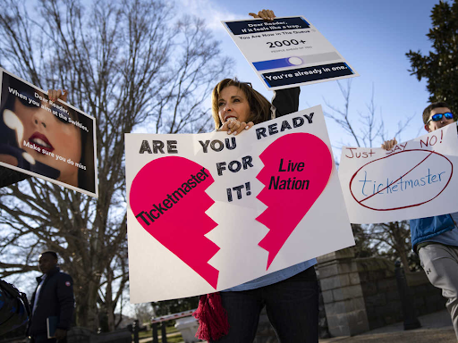 Angry fans are seen protesting Ticketmaster after the chaos surrounding Taylor Swift’s “The Era’s Tour” tickets. Fans creatively used some of Swift’s song titles in their protest, such as “...Ready For It?” and “Dear Reader”.