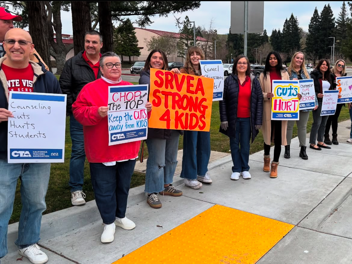 Teachers gather on the sidewalk along Stone Valley Road in front of the senior parking lot holding signs to raise awareness about the direct impact SRVUSD budget cuts will have on students.
